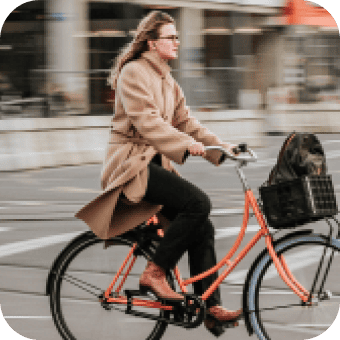 Woman cycling to work
